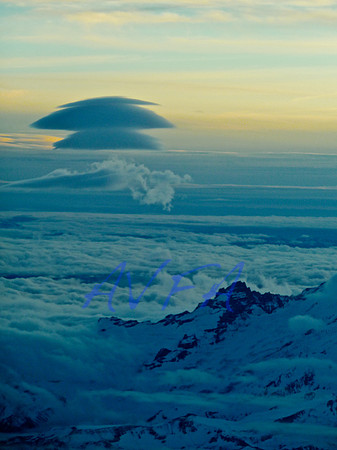 The side of Mt Rainier with standing lenticular clouds to the South East