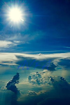 Sunburst over bowing cloud