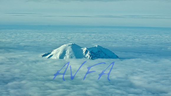 MT RAINIER TOP THRU CLOUDS